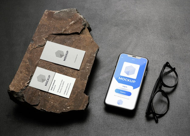 Free Stationery Mock-Up On Dark Concrete With Rugged Rock Psd