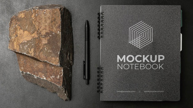 Free Stationery Mock-Up On Dark Concrete With Rugged Rock Psd