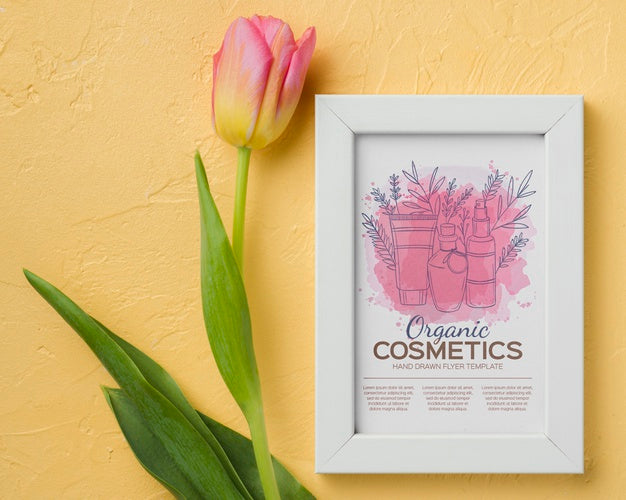 Free Top View Cosmetics Mockup With Flowers Psd