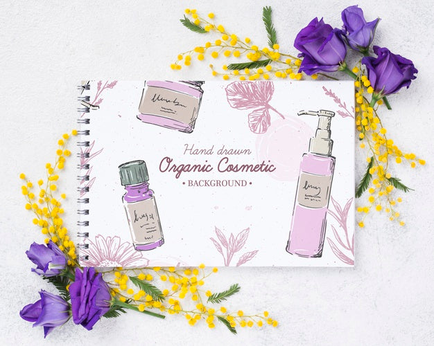 Free Top View Cosmetics Mockup With Flowers Psd