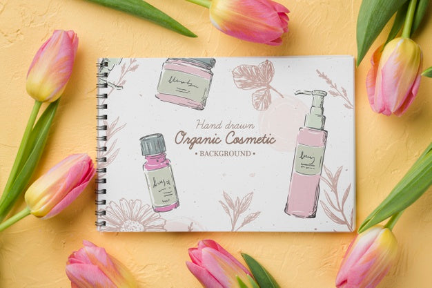 Free Top View Cosmetics Mockup With Flowers Psd