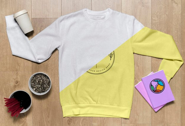 Free Top View Hoodie Mock-Up With Notebooks And Sunflower Seeds Psd