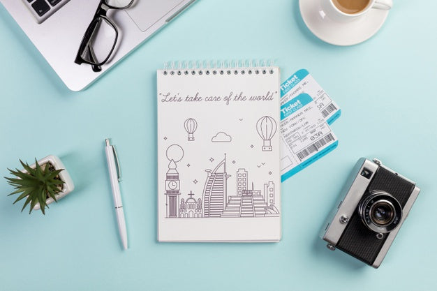 Free Top View Notebook With Flight Tickets And Camera Psd
