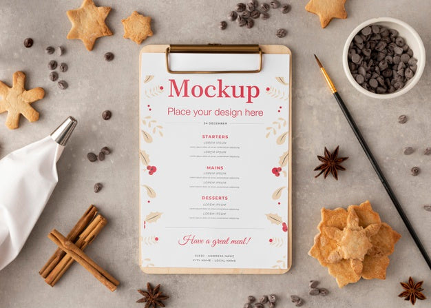 Free Top View Of Clipboard With Snowflake Cookies And Cinnamon Psd