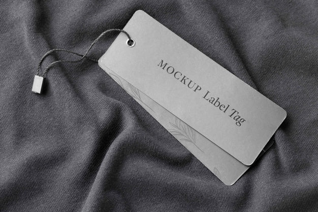 Free Top View Of Clothing Label On Black Fabric Psd