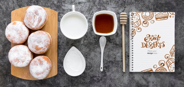 Free Top View Of Donuts With Milk And Honey Psd
