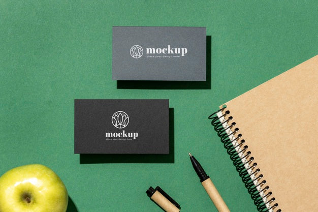 Free Top View Of Paper Stationery With Apple Psd