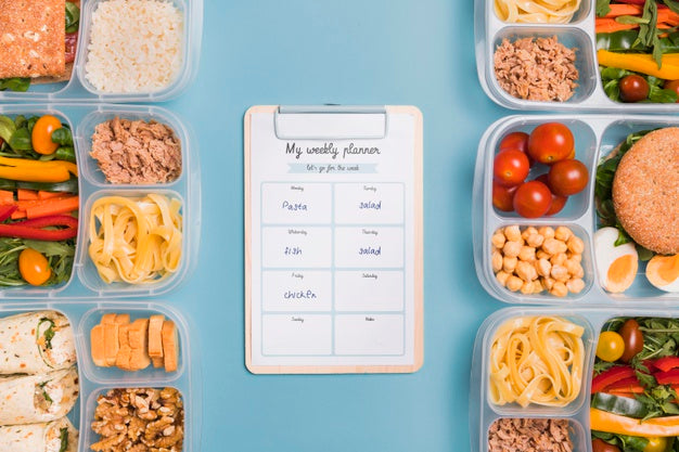Free Top View Of Planned Meals With Notepad Psd