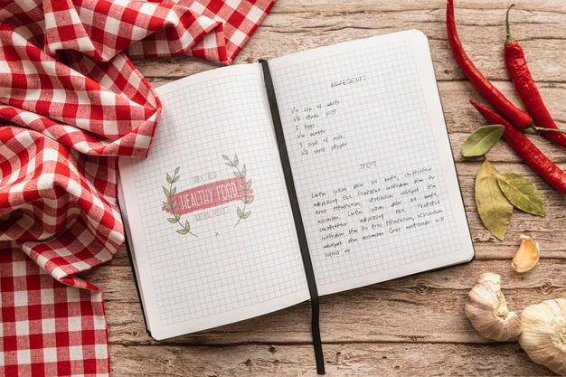 Free Top View Of Recipe With Tablecloth And Chili Peppers Psd