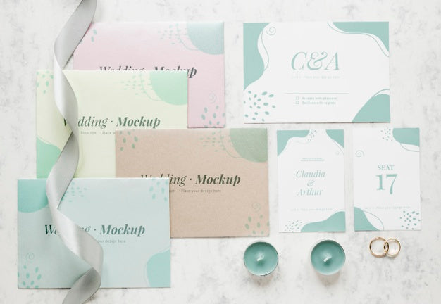 Free Top View Of Wedding Cards With Ribbon And Candles Psd