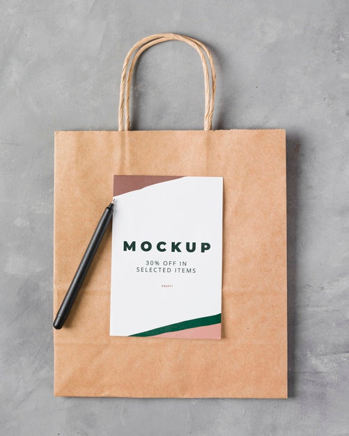Free Top View Paper Bag Mock-Up With Pen Psd