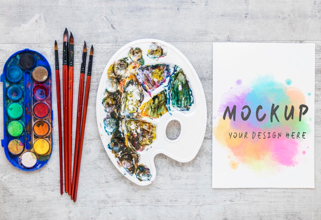 Free Top View Watercolor Elements Composition With Mock-Up Psd