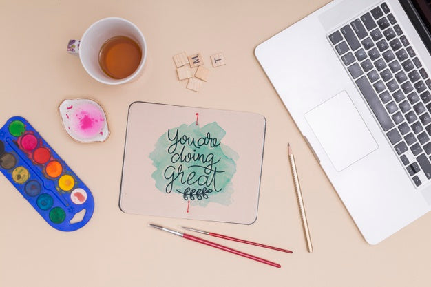 Free Top View Watercolors With Mock-Up Psd