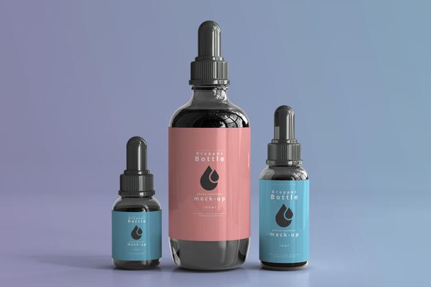 Free Various Size Dropper Bottle Mockup Scene Psd