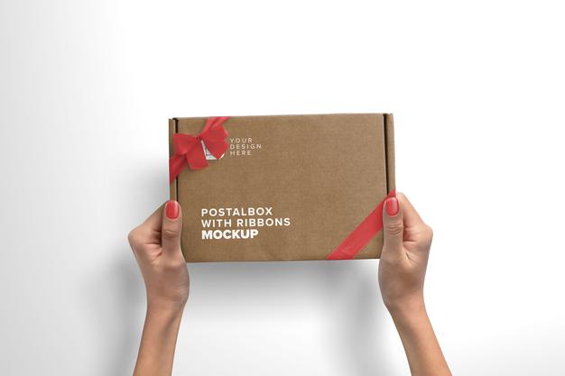 Free Woman Hands Holding Postal Box With Silk Ribbons Psd