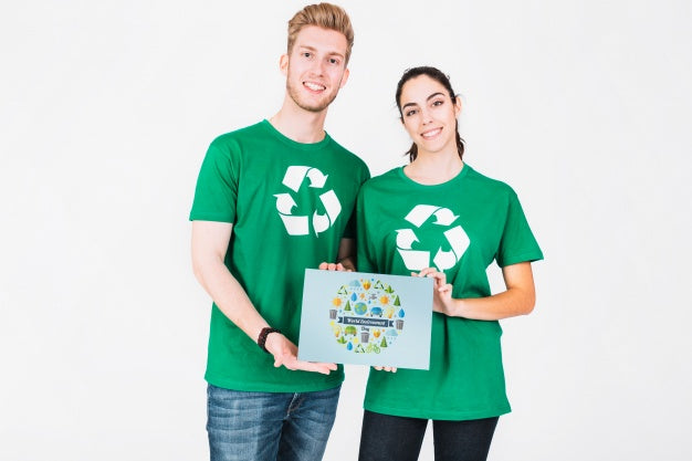Free World Environment Day Mockup With Volunteer Couple Holding Paper Psd