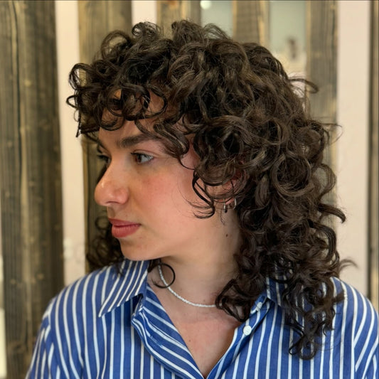 13 Curly Wolf Haircut Ideas That Redefine Curls ✂️
