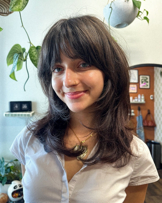 13 Go-To Short Layered Haircuts with Bangs for 2025