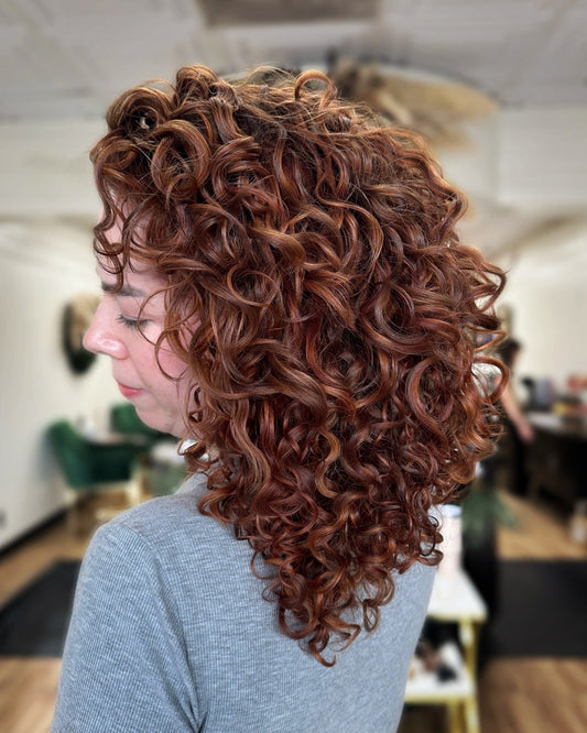 13 Layered Curly Hairstyles to Try in 2026
