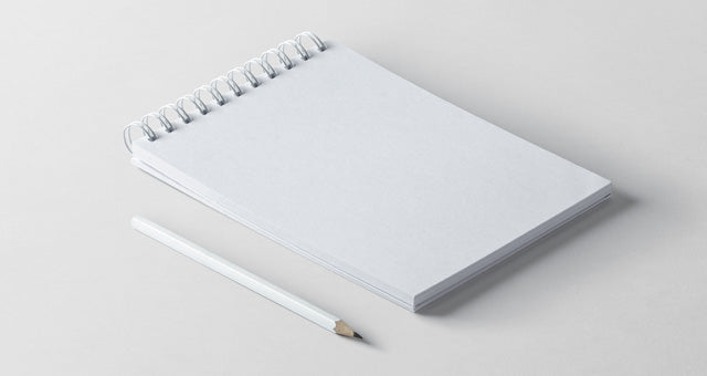 Free Perspective View of Ringed Notepad Mockup