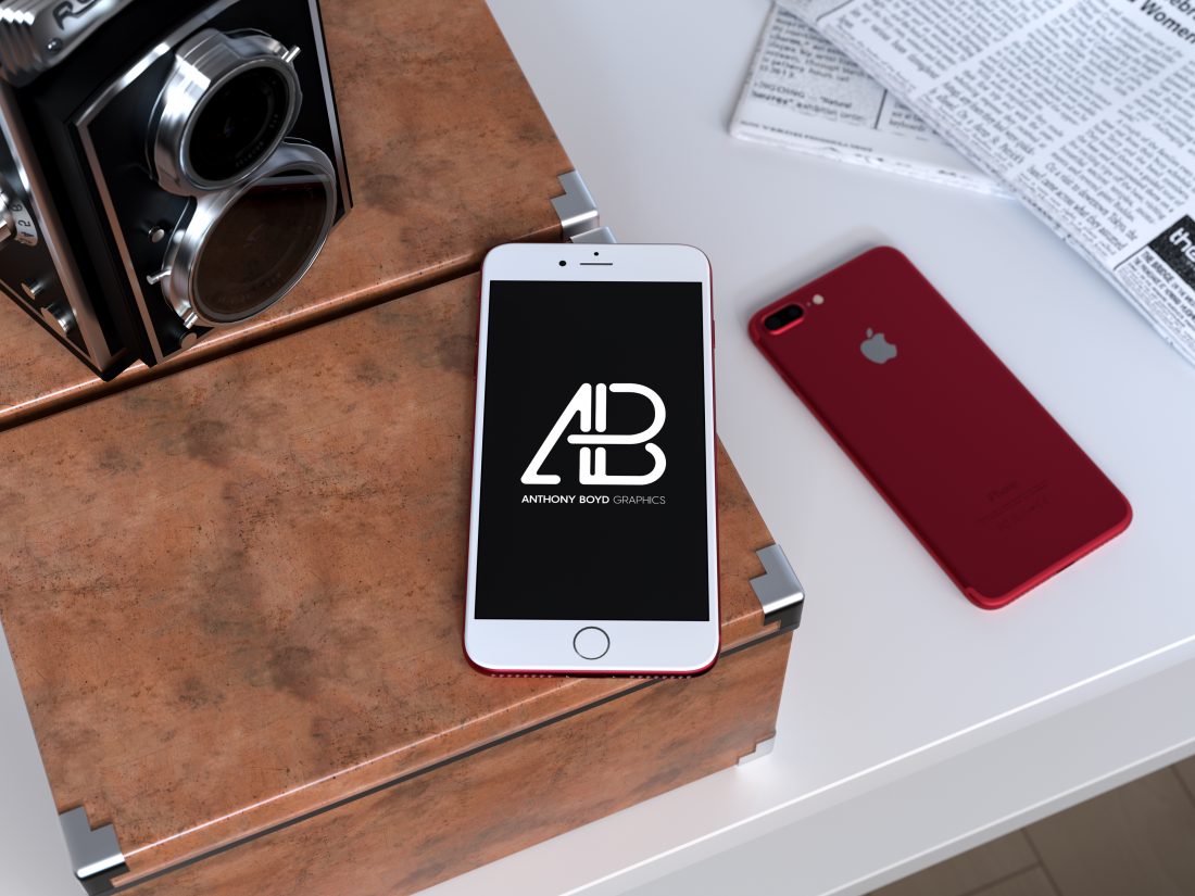 Free Product Red iPhone 7 Plus Mockup on the Table