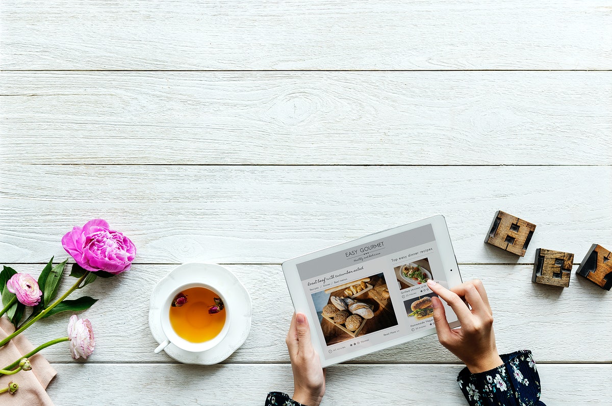 Free Aerial View Of A Woman Using Digital Tablet Cooking Hobby Concept