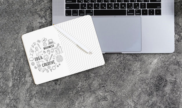 Free Agenda And Laptop On Desk Mock-Up Psd