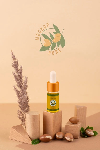 Free Argan Oil Cosmetic Bottle Mock-Up With Wooden-Shaped Podium And Kernels Psd