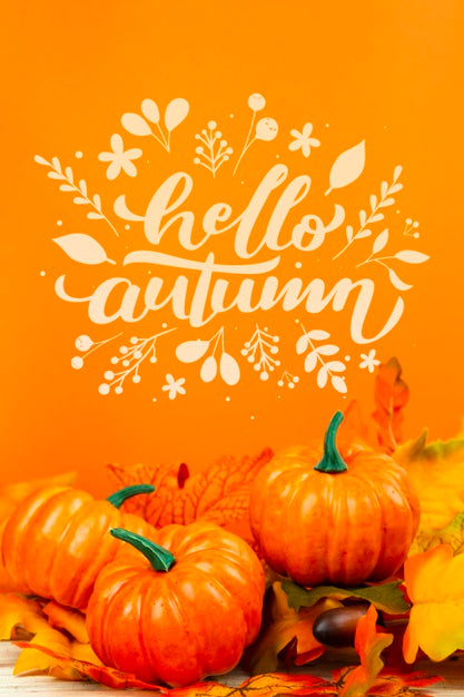 Free Arrangement With Pumpkins On Orange Background Psd