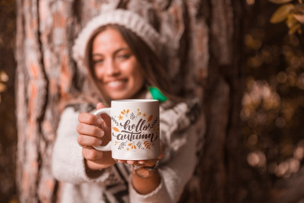 Free Autumn Concept With Woman Holding Mug Psd