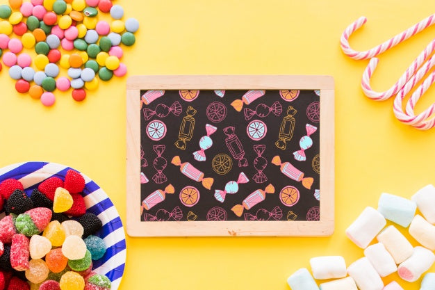 Free Back To School Composition With Slate And Sweets Psd