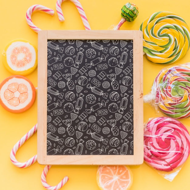 Free Back To School Composition With Slate And Sweets Psd