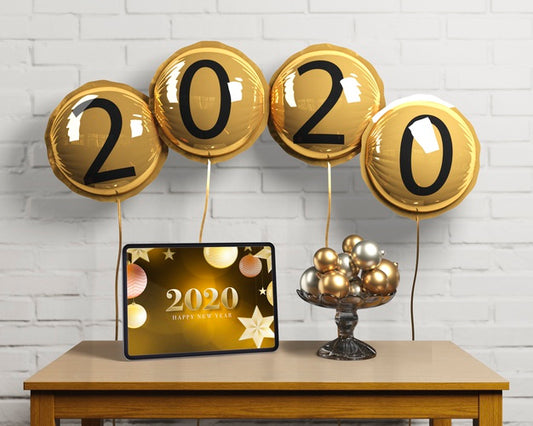 Free Balloons With New Year Number And Tablet Psd