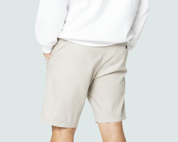 Free Beige Shorts Mockup On Man Psd