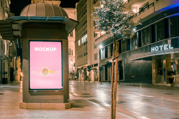 Free Billboard Mockup In Front Of Hotel Psd