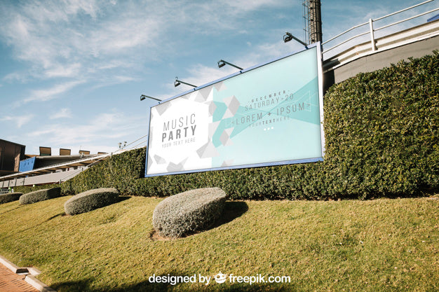 Free Billboard Mockup In Green Urban Environment Psd