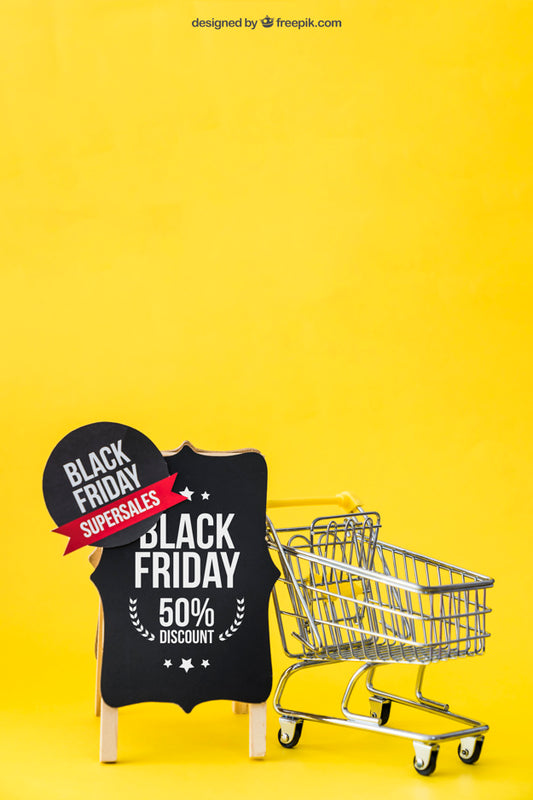 Free Black Friday Mockup With Shopping Cart Next To Board Psd