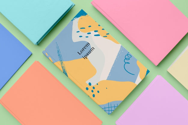 Free Books Assortment On Green Background Psd