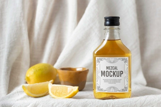 Free Bottle Of Mezcal Drink With Lemons Psd