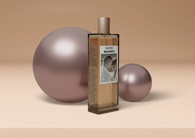 Free Bottle Of Perfume Beside Balls Psd