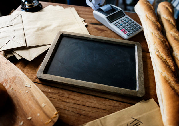 Free Bread Next To Slate In Shop Psd