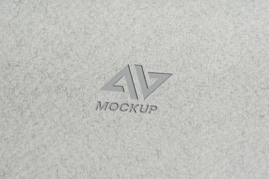 Free Capital Letter Mock-Up Logo Design On Minimalist Grey Paper Psd