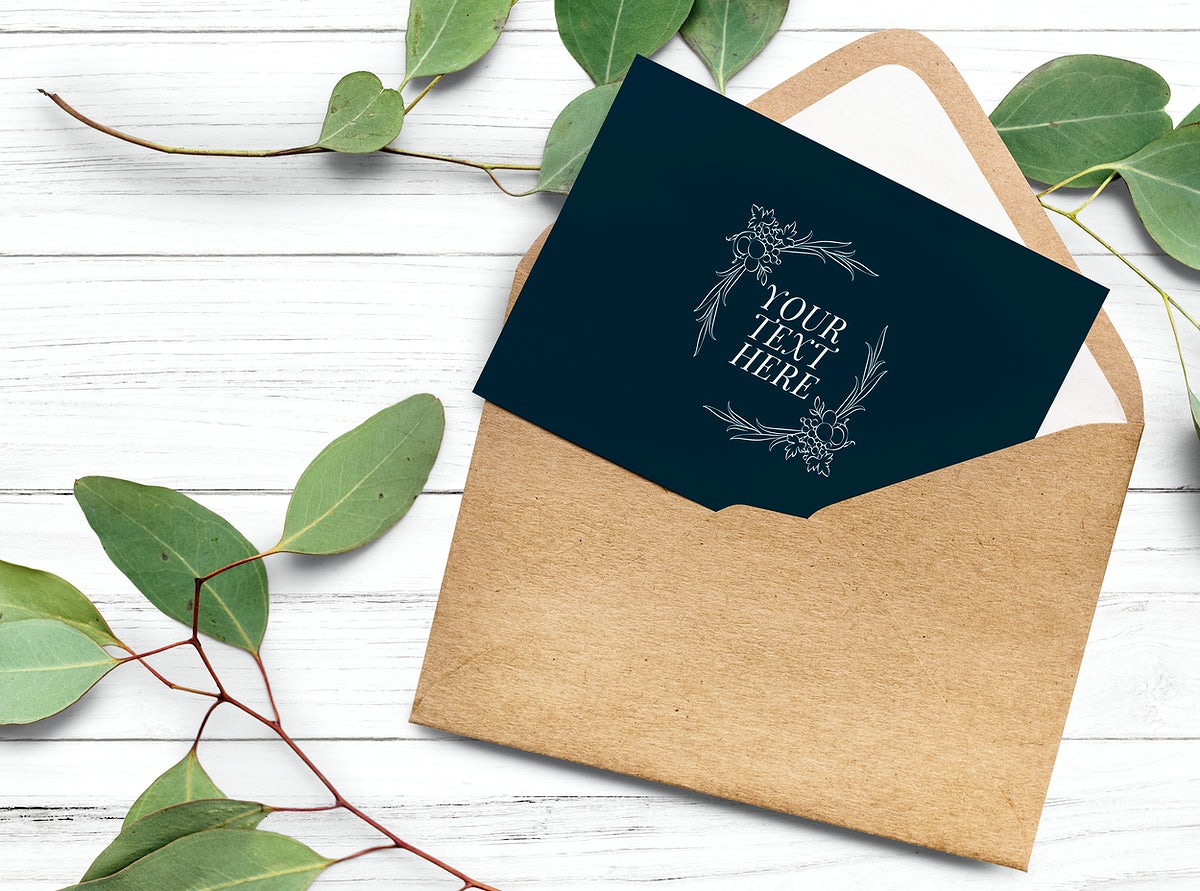 Free Card In An Envelope Mockup With Leaves In The Background