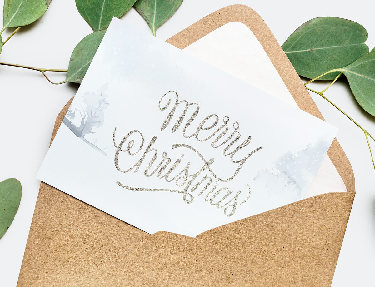 Free Card In An Envelope Mockup With Leaves In The Background