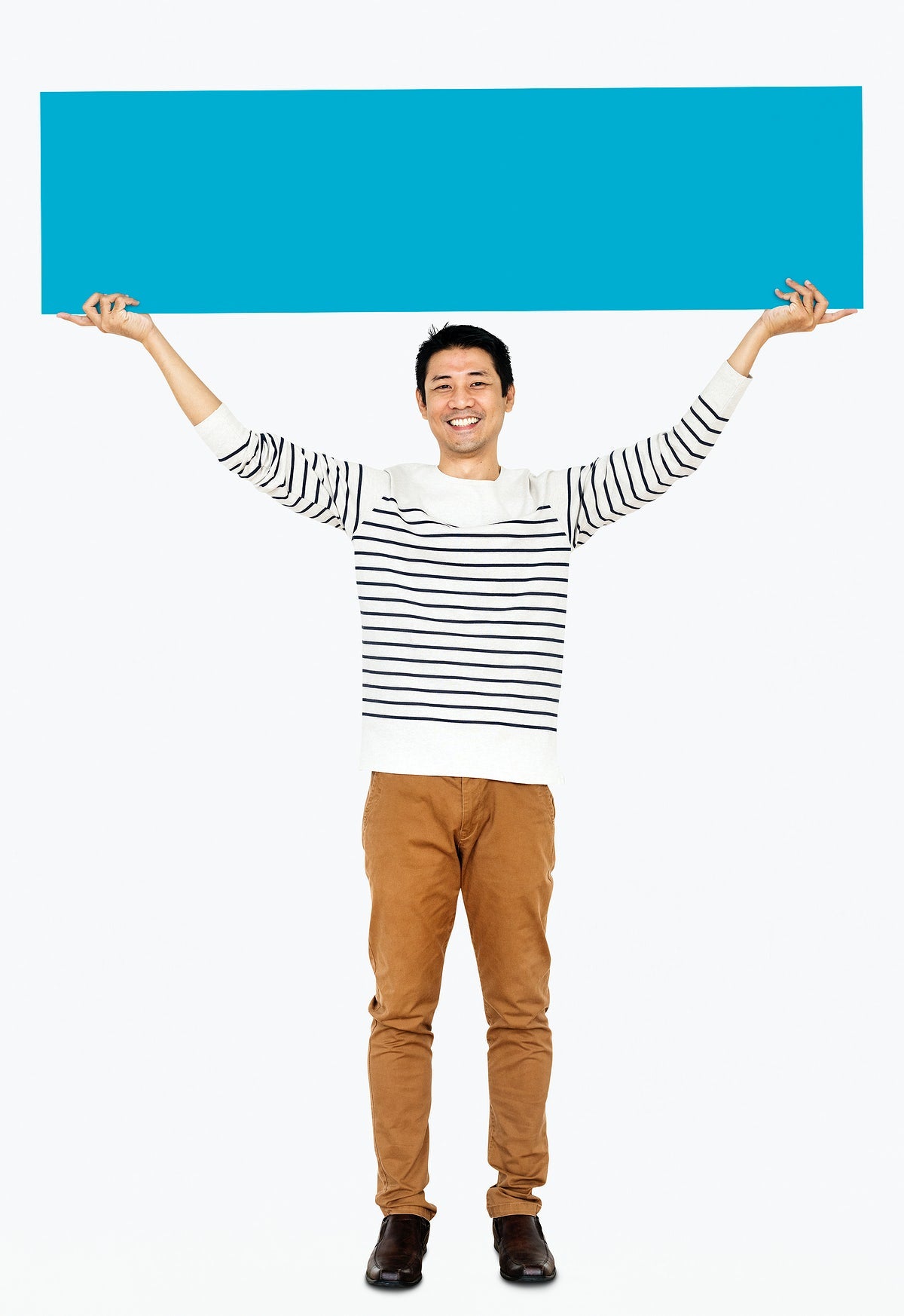 Free Cheerful Man Holding A Blank Blue Banner