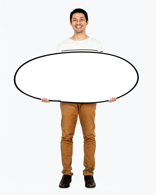 Free Cheerful Man Holding A Blank White Board