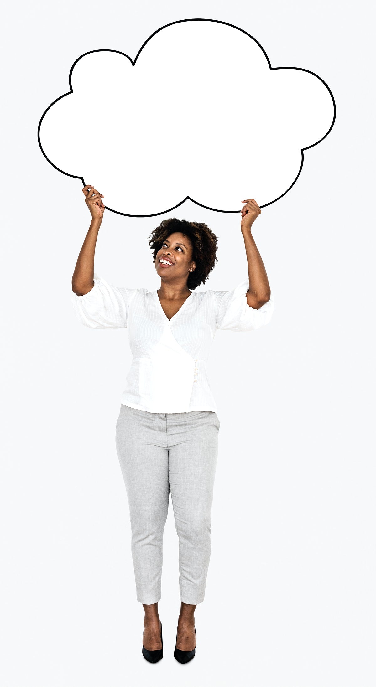 Free Cheerful Woman Showing A Blank White Cloud