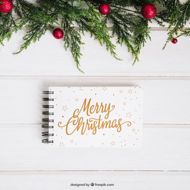 Free Christmas Mockup With Notepad Below Mistletoe Psd