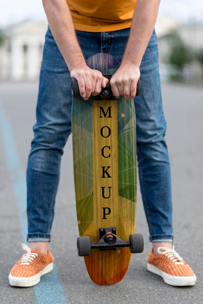 Free Close-Up Hands Holding Skateboard Psd