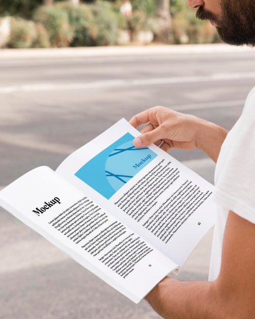 Free Close Up Man On Street Reading Book Psd